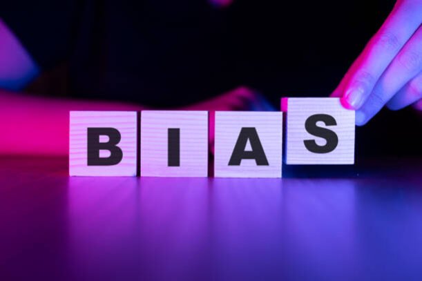 Bias word with wooden blocks on table